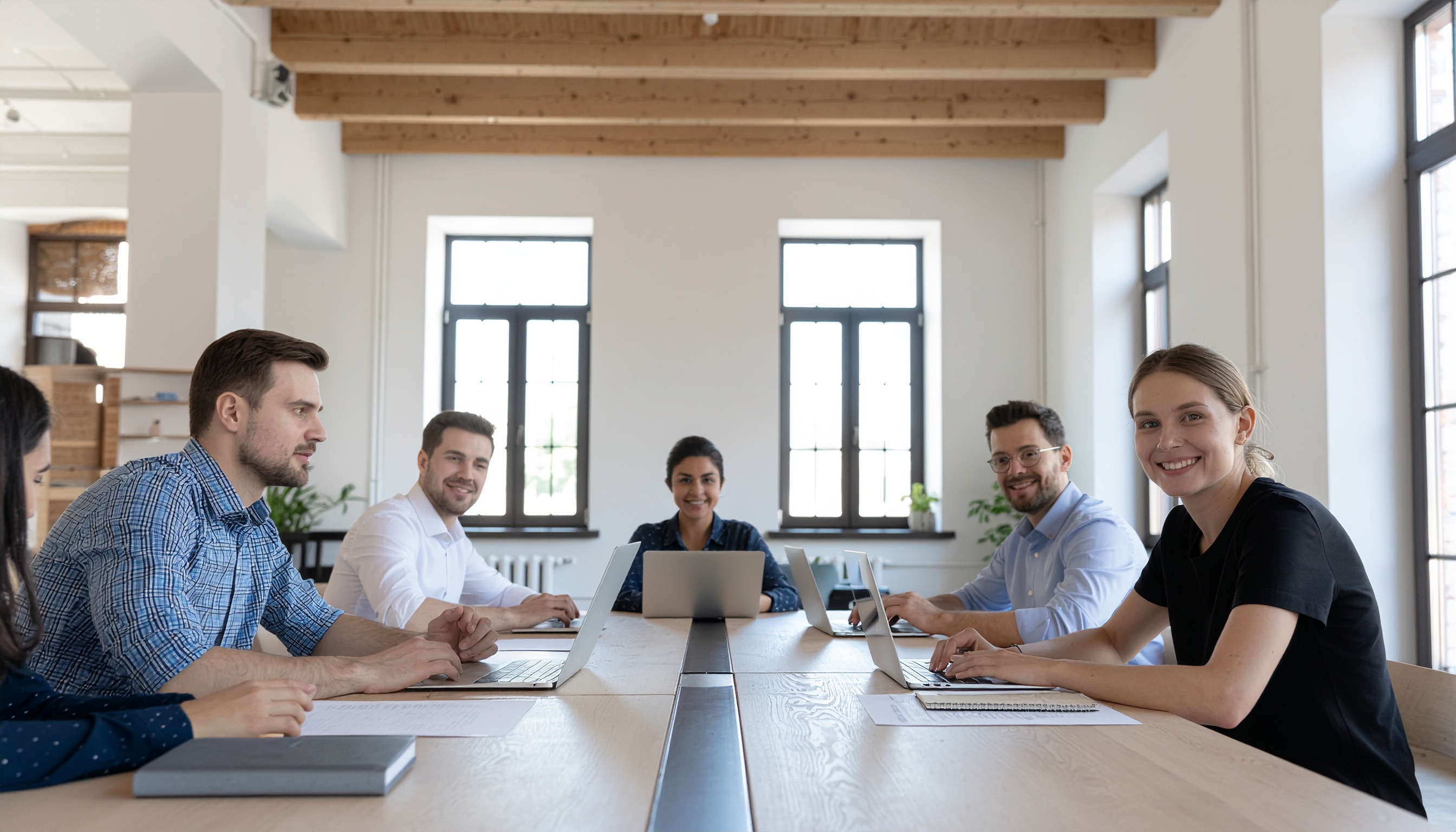 Collaborative Meeting in a Bright Conference Room